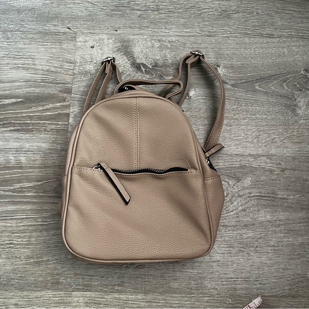Tan mini backpack
